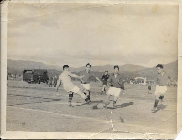 Unknown football match. Can anyone shed any light on the team or location?