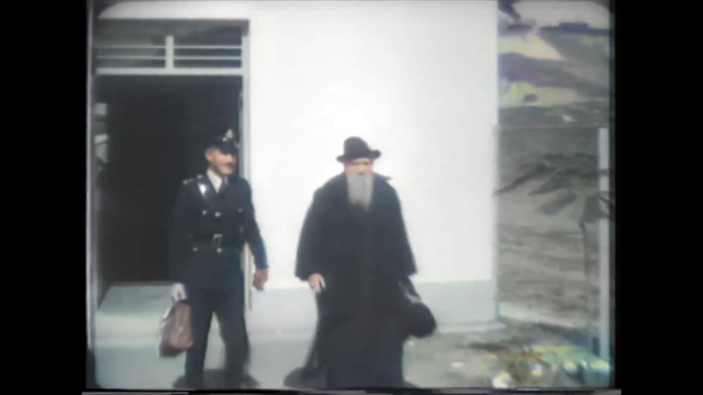 Colourised video frame of newsreel - 6