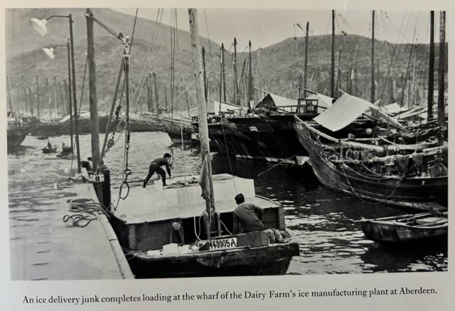 Photo of loading ice blocks onto a boat in the Dairy Farm Aberdeen ice-making plant