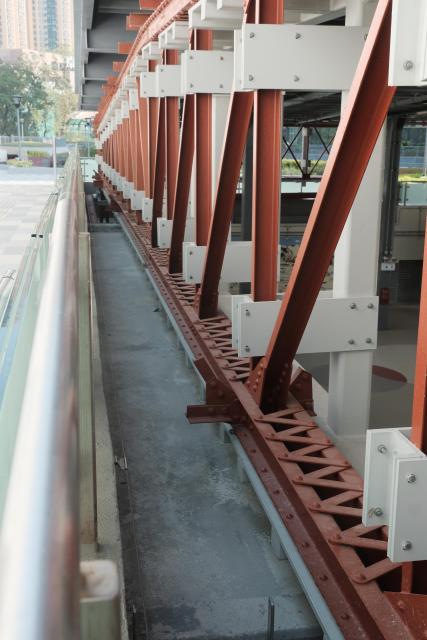 Surviving sections of original I-Beams fastened to new struture at the back