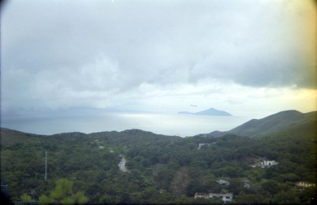 Plane taking off from Chek Lap Kok, July 1998