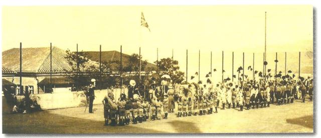 Saluting the flag at a Scouts and Cubs parade, St Joseph’s College, 15 March 1915.