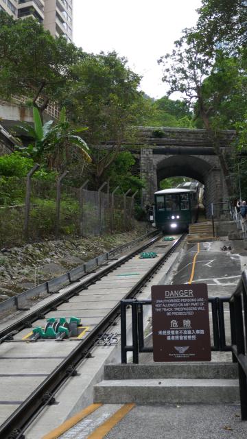 Peak Tram under the Magazine Gap Road bridge 