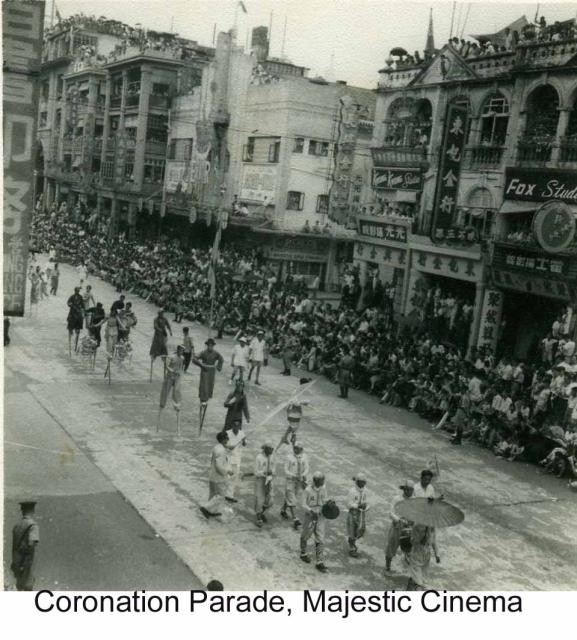 Coronation Parade 1953 on Nathan Road Stilt Walkers