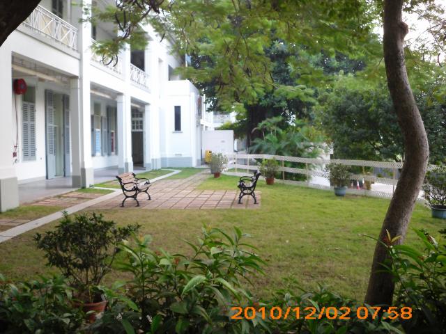 Side Lawn of The Former RAF Officers' Mess (Kai Tak) over a small hill top