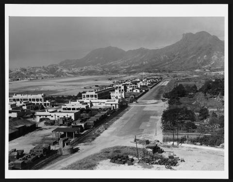 Kai Tak airfield, looking across eastern Kowloon to Lion Rock.