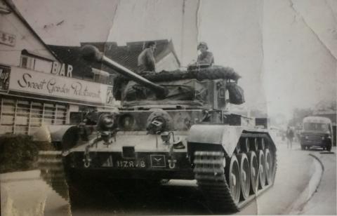Comet Tank drives by Sweet Garden Restaurant in Kam Tin 1959