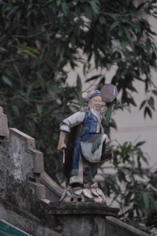 One of the stand alone Shek Wan Pottery Dolls