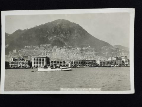 A Real Photo Postcard showing the Hongkong Hotel north phase expansion on both sides and Jardines Matheson House