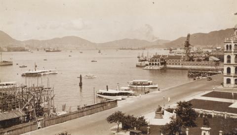 Queen's Pier (皇后碼頭) under construction, and part of Statue Square, Hong Kong
