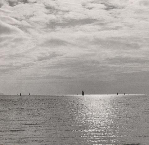 distant sampan on shining water 1956