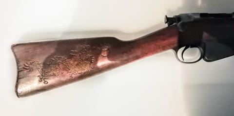 Engraved rifle butt