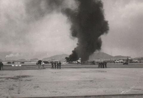 plane on fire kai tak 5 1954