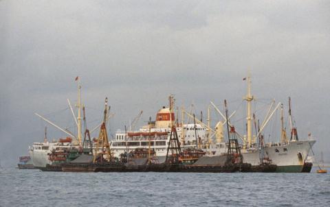 HAIXING passenger freighter loading in Hong Kong harbour 1983