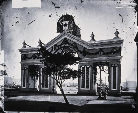 1869: Triumphal arch, Pedder's Wharf