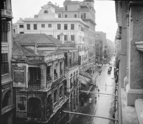 photo titled "Hong Kong, view looking down into street"