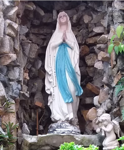 Close-up of the Mother Mary statue in the grotto at St. Anthony's Church