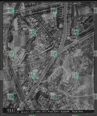 Aerial photo, 1949, shows Garden City Development with Kadoorie Avenue and Braga Circuit completed with gardens and trees, at the top