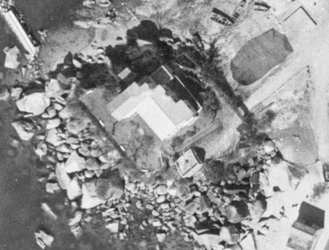 Aerial photo, 1963, shows building at Castle Peak on the water's edge (owned by Cheong Hing in 1938)