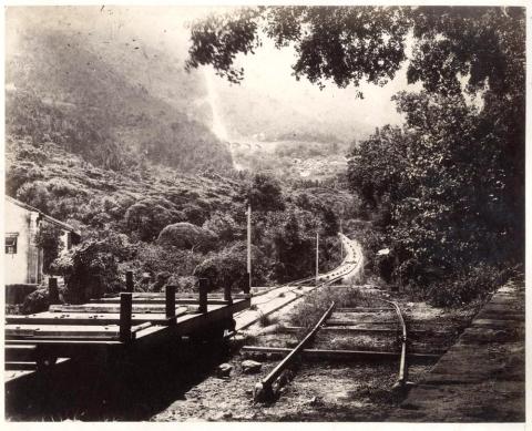 interesting view of the peak tram station garden road
