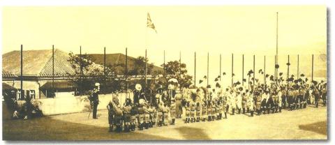Saluting the flag at a Scouts and Cubs parade, St Joseph’s College, 15 March 1915.