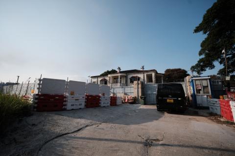 Enchi Lodge, all boarded up.