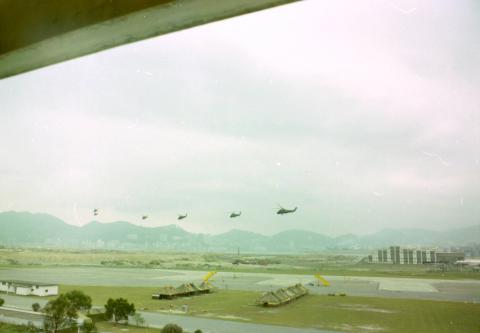 Six Wessex departing while the preparations for the visit of Concorde are proceeding in the foreground
