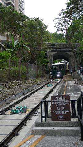Peak Tram under the Magazine Gap Road bridge 
