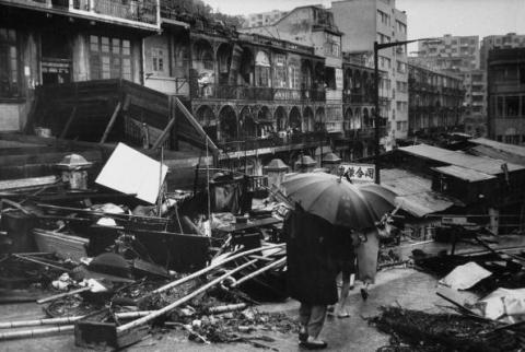 Damage to city done by typhoon Mary.1960