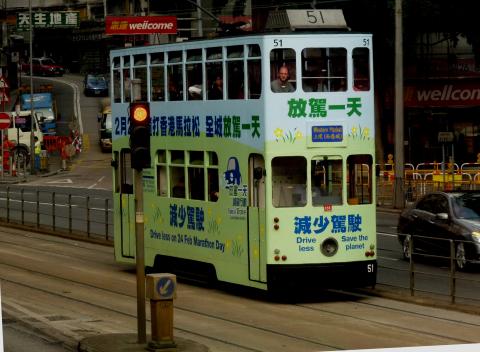 Sightseer on HK Tram - the best (and cheapest) seat in the house ....