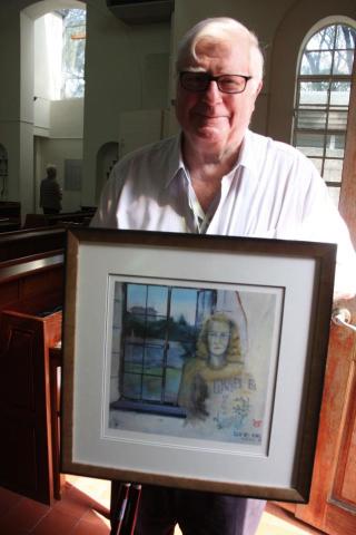 6. Conner Hackett with painting of his mother.jpg