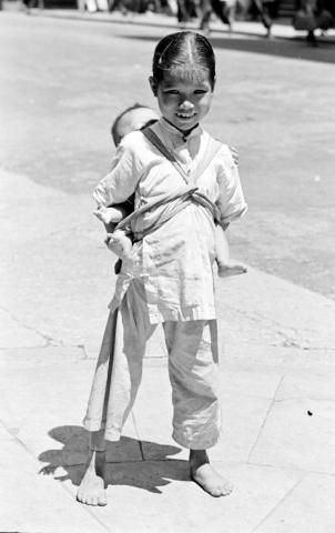 Little Girl with Baby 