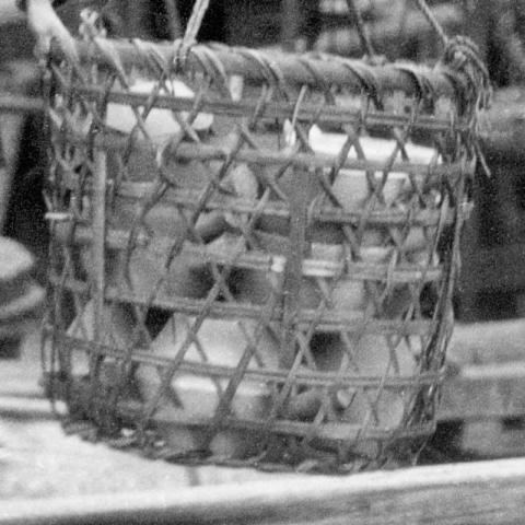 Basket of clay pots