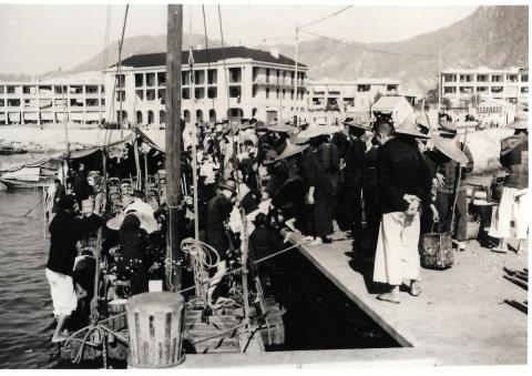 Unloading cans of rice Old Kowloon City