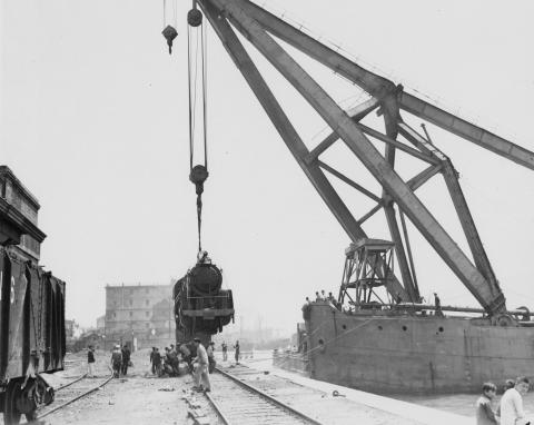 Lowering a locomotive on the tracks at KCR Terminus March 1947