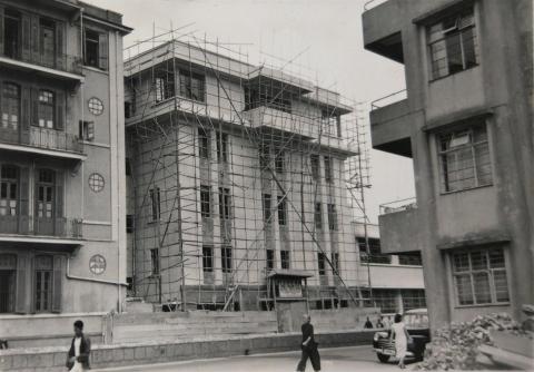 Four-story building under construction, designed by V. N. Dronnikoff
