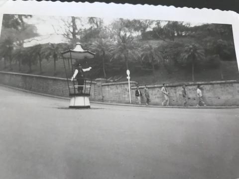 Directing the traffic at the junction of Garden Road and Kennedy Road.