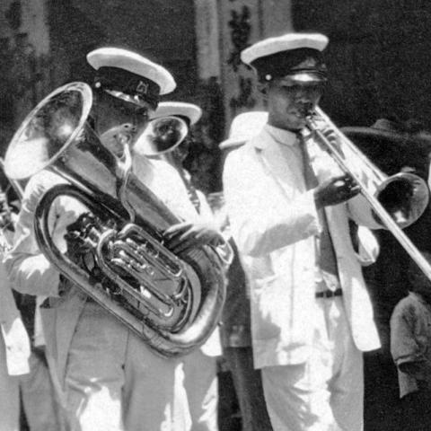 c.1929 Marching band taking part in a funeral procession