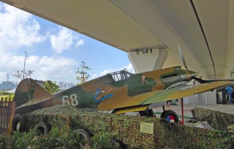 Curtis P40 fighter replica under flyover at Kwun Tong