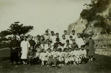  Miss Lucas with staff and children of the Foundling Home