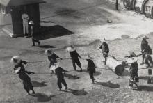 Women road menders, with a roller, Hong Kong 1933