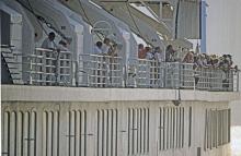 Queen Elizabeth 2 passengers anticipating going ashore-June 1997
