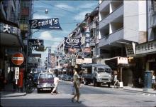 Cameron Road with signs for Caron Restaurant and Bennys Footwear
