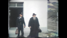 Colourised video frame of newsreel - 6