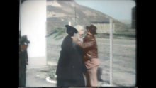 Colourised video frame of newsreel - 7