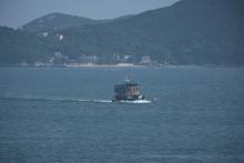 Mo Tat Wan at the back, Chuen Kee Ferry in front