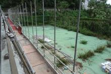 Tennis court below Barker Road