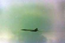 Flypast including low level (below the peak) through the harbour