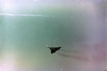 Flypast including low level (below the peak) through the harbour