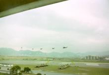 Six Wessex departing while the preparations for the visit of Concorde are proceeding in the foreground